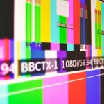 Vibrant test pattern screen with colorful bars and modern design.